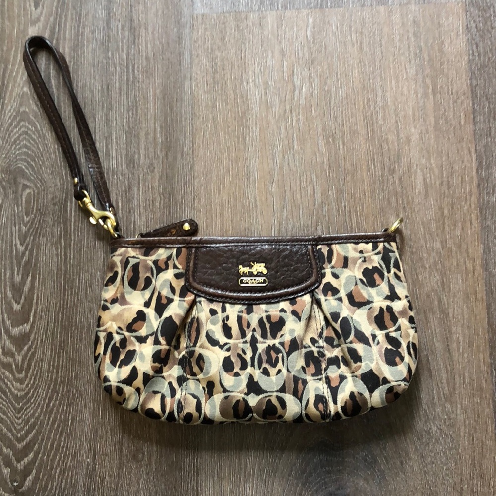 Coach brown and tan cheetah print logo wristlet